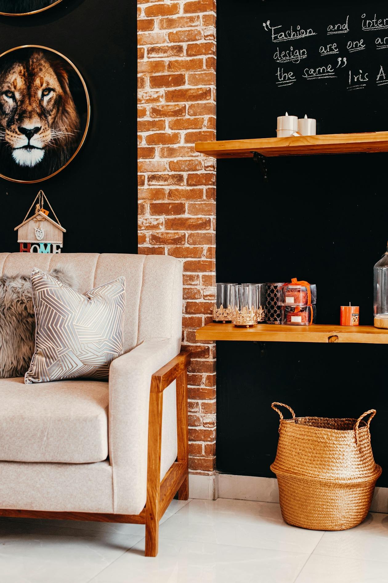 Cozy studio living area with sofa and warm wood floor